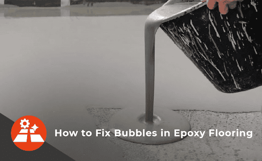 A worker pouring epoxy flooring mixture onto a surface