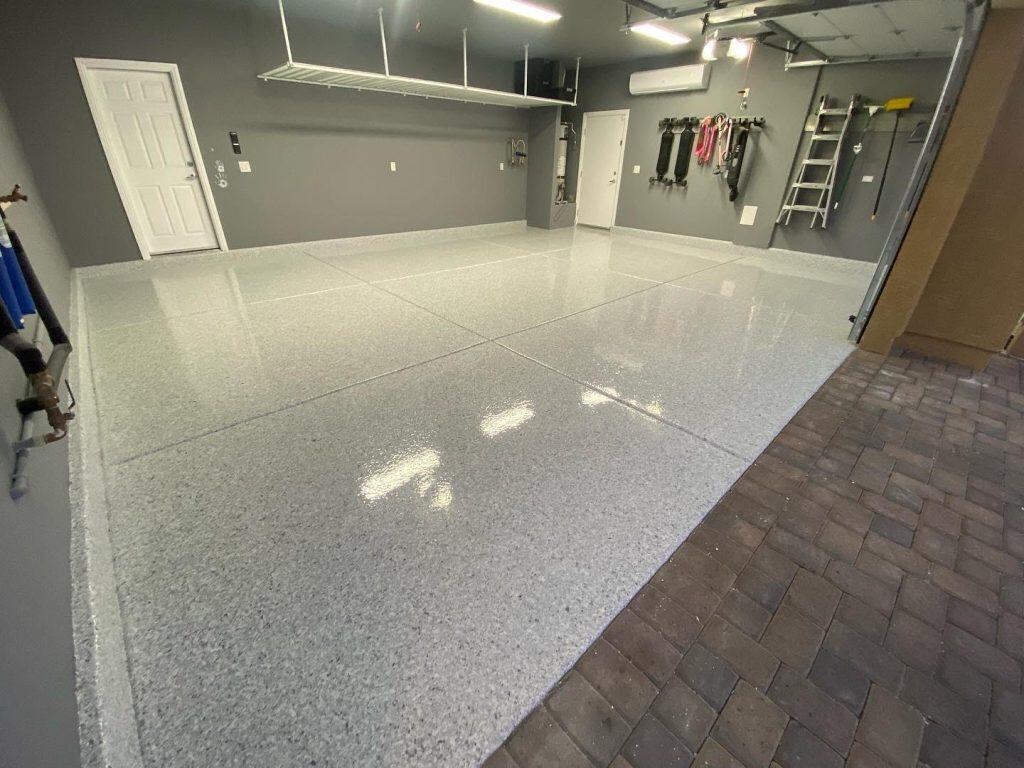 Modern interior showcasing clean epoxy flooring with decorative flakes